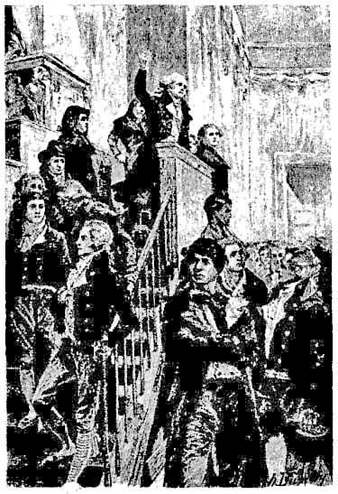 Street scene with a man at the top of the stairs speaking to the crowd